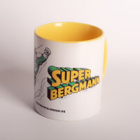 Ceramic mug, white and yellow, with mining motif...